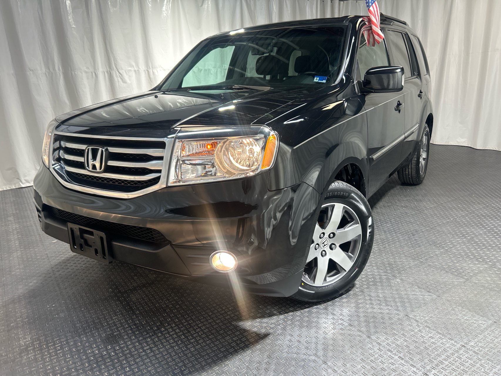 2014 Honda Pilot 4WD Touring w/RES & Navigation's photo