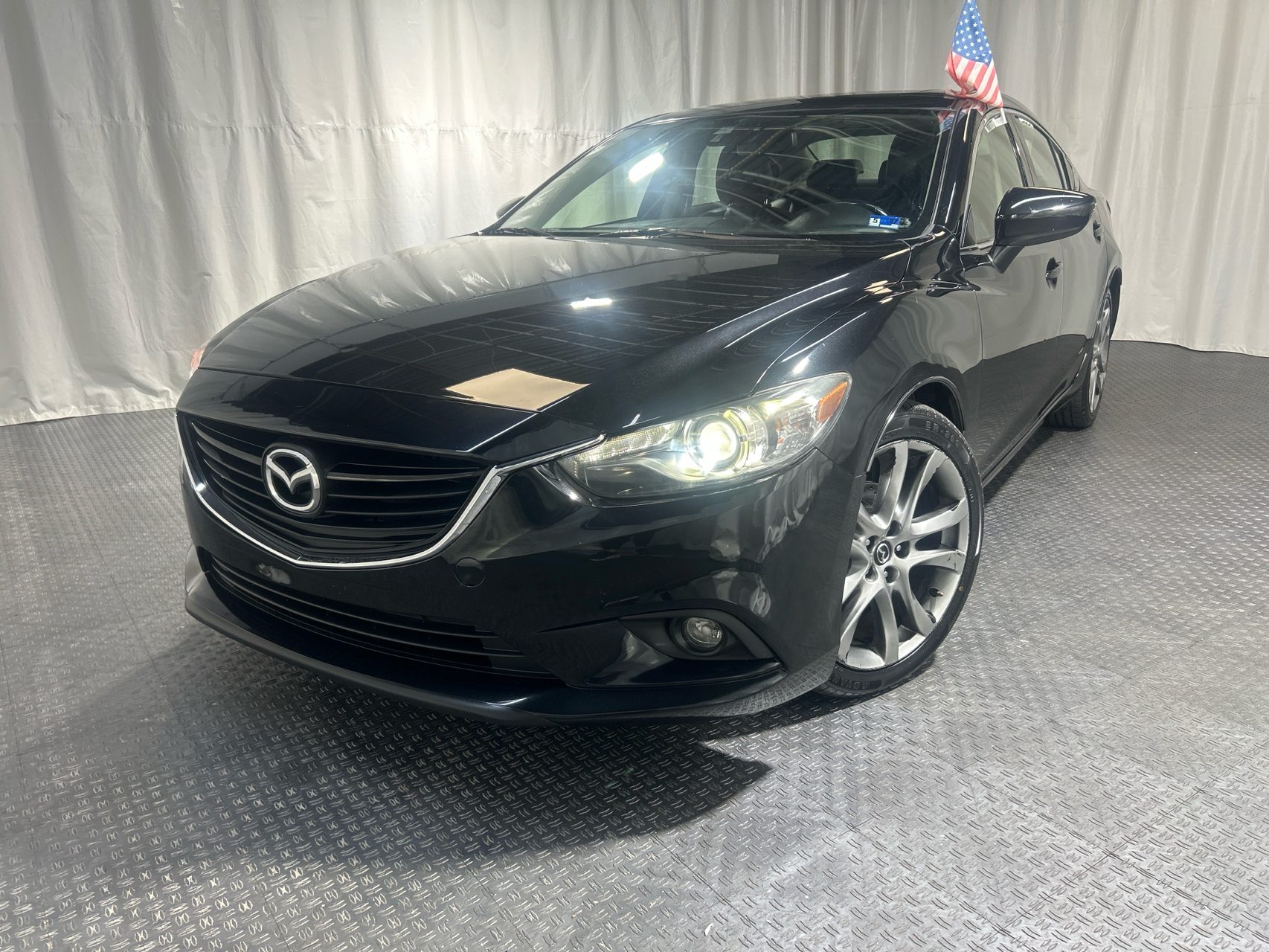 2014 Mazda EZ-6 i Grand Touring Auto's photo